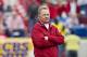 LITTLE ROCK, AR - NOVEMBER 19: Head Coach Bobby Petrino and the Arkansas Razorbacks watches his team warm up before a game against the Mississippi State Bulldogs at War Memorial Stadium on November 19, 2011 in Little Rock, Arkansas. The Razorbacks defeated the Bulldogs 44-17. (Photo by Wesley Hitt/Getty Images)