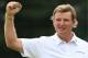 LYTHAM ST ANNES, ENGLAND - JULY 22: Ernie Els of South Africa reacts to a birdie putt on the 18th green during the final round of the 141st Open Championship at Royal Lytham & St. Annes Golf Club on July 22, 2012 in Lytham St Annes, England. (Photo by Andrew Redington/Getty Images)