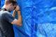 Emotions run high outside Joe Paterno's statue as it is removed.