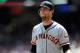 Another Long Walk Back to the Dugout for Giants First Baseman Brandon Belt