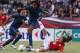PARIS, FRANCE - JULY 19: Homare Sawa of Japan is challenged by Wendie Renard during the friendly international match between Japan Women and France Women at Stade Charlety on July 19, 2012 in Paris, France. (Photo by David Rogers/Getty Images)