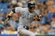 ST. PETERSBURG, FL - JULY 22: Outfielder Ichiro Suzuki #51 of the Seattle Mariners runs to first base after a bunt in the first inning against the Tampa Bay Rays July 22, 2012 at Tropicana Field in St. Petersburg, Florida. (Photo by Al Messerschmidt/Getty Images)