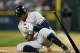 SEATTLE, WA - JULY 24: Alex Rodriguez #13 of the New York Yankees crumples to the ground after being hit with a pitch by starting pitcher Felix Hernandez of the Seattle Mariners at Safeco Field on July 24, 2012 in Seattle, Washington. Rodriguez was removed from the game. (Photo by Otto Greule Jr/Getty Images)