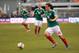 Jun 3, 2012; Arlington, TX, USA; Mexico midfielder Andres Guardado (18) dribbles the ball in the Brazil zone during the second half at Cowboys Stadium. Mexico shut out Brazil 2-0. Mandatory Credit: Jerome Miron-US PRESSWIRE