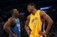 LOS ANGELES - JANUARY 16: Andrew Bynum #17 of the Los Angeles Lakers and Dwight Howard #12 of the Orlando Magic look on during a break in their NBA game on January 16, 2009 at Staples Center in Los Angeles, California. The Magic won 109-103. NOTE TO USER: User expressly acknowledges and agrees that, by downloading and/or using this Photograph, user is consenting to the terms and conditions of the Getty Images License Agreement. (Photo by Stephen Dunn/Getty Images)