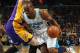 NEW ORLEANS, LA - APRIL 09: Carl Landry #24 of the New Orleans Hornets drives the ball around Josh McRoberts #6 of the Los Angeles Lakers rleans, Louisiana. NOTE TO USER: User expressly acknowledges and agrees that, by downloading and or using this photograph, User is consenting to the terms and conditions of the Getty Images License Agreement. (Photo by Chris Graythen/Getty Images)