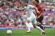 MANCHESTER, UNITED KINGDOM - JULY 29: Kosta Barbarousses of New Zealand battles for the ball during the Men's Football first round Group C Match between Egypt and New Zealand on Day 2 of the London 2012 Olympic Games at Old Trafford on July 29, 2012 in Manchester, England. (Photo by Francis Bompard/Getty Images)