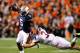 AUBURN, AL - NOVEMBER 26: Michael Dyer #5 of the Auburn Tigers is tackled by Vinnie Sunseri #3 of the Alabama Crimson Tide at Jordan-Hare Stadium on November 26, 2011 in Auburn, Alabama. (Photo by Kevin C. Cox/Getty Images)