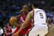 Apr 25, 2012; Milwaukee, WI, USA; Philadelphia 76ers guard Jodie Meeks (20) controls the ball as Milwaukee Bucks guard Shaun Livingston (9) defends during the first quarter at the Bradley Center. Mandatory Credit: Jeff Hanisch-US PRESSWIRE