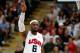LONDON, ENGLAND - JULY 29: Lebron James #6 of United States points during their Men's Basketball Game against France on Day 2 of the London 2012 Olympic Games at the Basketball Arena on July 29, 2012 in London, England. (Photo by Jamie Squire/Getty Images)
