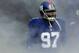 Defensive tackle Linval Joseph emerges from the Giants tunnel.