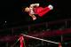 LONDON, ENGLAND - JULY 28: Kohei Uchimura of Japan competes in the horizontal bars in the Artistic Gymnastics Men's Team qualification on Day 1 of the London 2012 Olympic Games at North Greenwich Arena on July 28, 2012 in London, England. (Photo by Mike Hewitt/Getty Images)