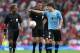 MANCHESTER, ENGLAND - JULY 26: Luis Suarez of Uruguay talks to the referee during the Men's Football first round Group A Match of the London 2012 Olympic Games between UAE and Uruguay, at Old Trafford on July 26, 2012 in Manchester, England. (Photo by Julian Finney/Getty Images)