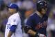 KANSAS CITY, MO - AUGUST 01: Shin-Soo Choo #17 of the Cleveland Indians walks to first after being hit by a pitch in the eighth inning at Kauffman Stadium on August 1, 2012 in Kansas City, Missouri. (Photo by Ed Zurga/Getty Images)