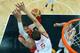 Pau Gasol (in red) couldn't hold on to beat Russia (in white) earlier today