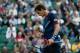 LONDON, ENGLAND - AUGUST 03: Andy Murray of Great Britain celebrates a point against Novak Djokovic of Serbia in the Semifinal of Men's Singles Tennis on Day 7 of the London 2012 Olympic Games at Wimbledon on August 3, 2012 in London, England. (Photo by Clive Brunskill/Getty Images)