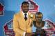 CANTON, OH - AUGUST 4: Former running back Curtis Martin with his bust during the Class of 2012 Pro Football Hall of Fame Enshrinement Ceremony at Fawcett Stadium on August 4, 2012 in Canton, Ohio. (Photo by Jason Miller/Getty Images)