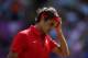 LONDON, ENGLAND - AUGUST 05: Roger Federer of Switzerland reacts during the Men's Singles Tennis Gold Medal Match against Andy Murray of Great Britain on Day 9 of the London 2012 Olympic Games at the All England Lawn Tennis and Croquet Club on August 5, 2012 in London, England. (Photo by Clive Brunskill/Getty Images)