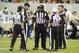 CANTON, OH - AUGUST 5: Game officials discuss the running of a play during the second half of the Pro Football Hall of Fame game at Fawcett Stadium on August 5, 2012 in Canton, Ohio. The Saints defeated the Cardinals 17-10. (Photo by Jason Miller/Getty Images)