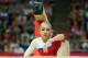 LONDON, ENGLAND - AUGUST 07: Victoria Komova of Russia falls during her dismount during the Artistic Gymnastics Women's Beam final on Day 11 of the London 2012 Olympic Games at North Greenwich Arena on August 7, 2012 in London, England. (Photo by Ronald Martinez/Getty Images)