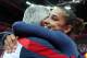 Aly Raisman hugs her coach Mihai Brestyan after a near perfect routine in the floor finals.