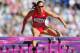 LONDON, ENGLAND - AUGUST 06: Lolo Jones of the United States competes in the Women's 100m Hurdles heat on Day 10 of the London 2012 Olympic Games at the Olympic Stadium on August 6, 2012 in London, England. (Photo by Stu Forster/Getty Images)