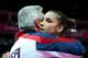 LONDON, ENGLAND - AUGUST 07: Alexandra Raisman of the United States hugs coach Mihai Brestyan after she competes on the beam during the Artistic Gymnastics Women's Beam final on Day 11 of the London 2012 Olympic Games at North Greenwich Arena on August 7, 2012 in London, England. (Photo by Ronald Martinez/Getty Images)