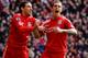 LIVERPOOL, ENGLAND - JANUARY 28: Daniel Agger of Liverpool celebrates scoring the opening goal with Maxi (L) during the FA Cup Fourth Round match between Liverpool and Manchester United at Anfield on January 28, 2012 in Liverpool, England. (Photo by Alex Livesey/Getty Images)