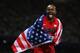 LONDON, ENGLAND - AUGUST 08: Aries Merritt of the United States celebrates after winning gold in the Men's 110m Hurdles Final on Day 12 of the London 2012 Olympic Games at Olympic Stadium on August 8, 2012 in London, England. (Photo by Clive Brunskill/Getty Images)