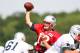 Aug 7, 2012; Foxborough, MA, USA; New England Patriots quarterback Tom Brady passes against the New Orleans Saints during a joint practice at the teams practice facility. Mandatory Credit: Stew Milne-US PRESSWIRE
