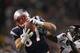 FOXBORO, MA - JANUARY 14: Rob Gronkowski #87 of the New England Patriots catches a pass against the Denver Broncos during their AFC Divisional Playoff Game at Gillette Stadium on January 14, 2012 in Foxboro, Massachusetts. (Photo by Al Bello/Getty Images)