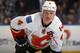 UNIONDALE, NY - DECEMBER 29: Jay Bouwmeester #4 of the Calgary Flames skates against the New York Islanders at the Nassau Veterans Memorial Coliseum on December 29, 2011 in Uniondale, New York. The Islanders defeated the Flames 3-1. (Photo by Bruce Bennett/Getty Images)