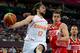 LONDON, ENGLAND - AUGUST 10: Sergio Llull #12 of Spain looks to pass the ball against Alexander Kaun #8 of Russia during the Men's Basketball semifinal match on Day 14 of the London 2012 Olympic Games at the Basketball Arena on August 10, 2012 in London, England. (Photo by Lars Baron/Getty Images)