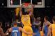 LOS ANGELES, CA - MAY 19: Andrew Bynum #17 of the Los Angeles Lakers dunks the ball over Kendrick Perkins #5 of the Oklahoma City Thunder in the third quarter in Game Four of the Western Conference Semifinals in the 2012 NBA Playoffs on May 19 at Staples Center in Los Angeles, California. NOTE TO USER: User expressly acknowledges and agrees that, by downloading and or using this photograph, User is consenting to the terms and conditions of the Getty Images License Agreement. (Photo by Stephen Dunn/Getty Images)