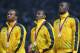 LONDON, ENGLAND - AUGUST 11: Gold medalists Michael Frater, Yohan Blake and Usain Bolt of Jamaica celebrate on the podium during the medal ceremony for the Men's 4 x 100m Relay Final on Day 15 of the London 2012 Olympic Games at Olympic Stadium on August 11, 2012 in London, England. (Photo by Ronald Martinez/Getty Images)