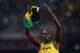 LONDON, ENGLAND - AUGUST 11: Usain Bolt of Jamaica celebrates winning gold and setting a new world record of 36.84 during the Men's 4 x 100m Relay Final on Day 15 of the London 2012 Olympic Games at Olympic Stadium on August 11, 2012 in London, England. (Photo by Clive Brunskill/Getty Images)
