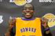 EL SEGUNDO, CA - AUGUST 10: Dwight Howard (L) is introduced to the media as the newest member of the Los Angeles Lakers by General Manager Mitch Kupchak during a news conference at the Toyota Sports Center on August 10, 2012 in El Segundo, California. The Lakers aquired Howard from Orlando Magic in a four-team trade. In addition, Lakers wil receive Chris Duhon and Earl Clark from the Magic. (Photo by Kevork Djansezian/Getty Images)