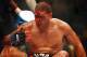 May 26, 2012; Las Vegas, NV, USA; Blood drips down the forehead of Antonio Silva during his fight against Cain Velasquez during UFC 146 at the MGM Grand Garden event center. Mandatory Credit: Ron Chenoy-US PRESSWIRE