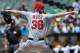 OAKLAND, CA - MAY 23: Jered Weaver #36 of the Los Angeles Angels of Anaheim pitches against the Oakland Athletics at O.co Coliseum on May 23, 2012 in Oakland, California. (Photo by Thearon W. Henderson/Getty Images)