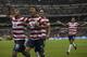 MEXICO CITY, MEXICO - AUGUST 15: Michael Orozco of the United States celebrates after scoring during a FIFA friendly match between Mexico and US at Azteca Stadium on August 15, 2012 in Mexico City, Mexico. (Photo by Miguel Tovar/Getty Images)