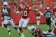 KANSAS CITY, MO - AUGUST 10: Running back Peyton Hillis #40 of the Kansas City Chiefs rushes past free safety Kerry Rhodes #25 of the Arizona Cardinals during the first half on August 10, 2012 at Arrowhead Stadium in Kansas City, Missouri. (Photo by Peter Aiken/Getty Images)