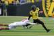 EUGENE, OR - OCTOBER 29: Quarterback Bryan Bennett #2 of the Oregon Ducks avoids the diving tackle of Deone Bucannon #20 of the Washington State Cougars in the third quarter of the game at Autzen Stadium on October 29, 2011 in Eugene, Oregon. Oregon won the game 43-28.(Photo by Steve Dykes/Getty Images)