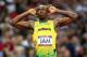 LONDON, ENGLAND - AUGUST 11: Usain Bolt of Jamaica celebrates winning gold and setting a new world record of 36.84 during the Men's 4 x 100m Relay Final on Day 15 of the London 2012 Olympic Games at Olympic Stadium on August 11, 2012 in London, England. (Photo by Ronald Martinez/Getty Images)