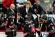RALEIGH, NC - JANUARY 06: Coach Kirk Muller of the Carolina Hurricanes huddles with his team during a timeout in the final minutes of play against the Buffalo Sabres at the RBC Center on January 6, 2012 in Raleigh, North Carolina. The Hurricanes won 4-2. (Photo by Grant Halverson/Getty Images)