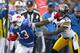 ORCHARD PARK, NY - NOVEMBER 28: Steve Johnson #13 of the Buffalo Bills is pushed out of bounds by William Gay #22 of the Pittsburgh Steelers at Ralph Wilson Stadium at Ralph Wilson Stadium on November 28, 2010 in Orchard Park, New York. Pittsburgh won 19-16 in overtime. (Photo by Rick Stewart/Getty Images)