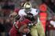 STANFORD, CA - NOVEMBER 26: Louis Nix III #9 of the Notre Dame Fighting Irish tackles Anthony Wilkerson #32 of the Stanford Cardinal at Stanford Stadium on November 26, 2011 in Stanford, California. (Photo by Ezra Shaw/Getty Images)