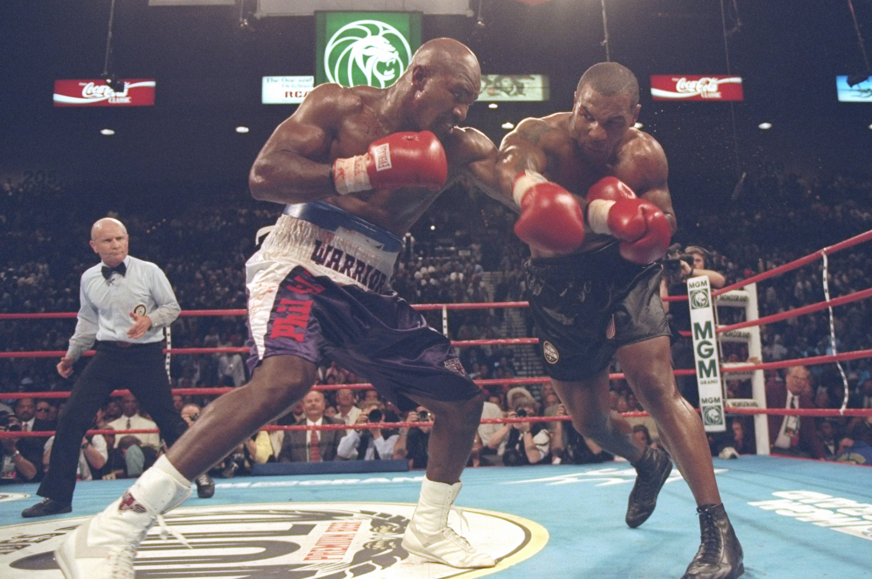 Evander Holyfield's Gloves From Tyson Ear Bite Fight Hit Auction Block