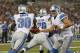 August 17, 2012; Baltimore, MD, USA; Detroit Lions quarterback Matthew Stafford (9) hands off to running back Kevin Smith (30) their preseason game against the Baltimore Ravens at M&T Bank Stadium. Mandatory Credit: Mitch Stringer-US PRESSWIRE