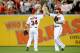 WASHINGTON, DC - AUGUST 21: Bryce Harper #34 and Jayson Werth #28 of the Washington Nationals celebrate after defeating the Atlanta Braves 4-1 at Nationals Park on August 21, 2012 in Washington, DC. (Photo by Patrick McDermott/Getty Images)