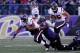BALTIMORE, MD - JANUARY 15: Cory Redding #93 of the Baltimore Ravens tackles Arian Foster #23 of the Houston Texans during the third quarter of the AFC Divisional playoff game at M&T Bank Stadium on January 15, 2012 in Baltimore, Maryland. (Photo by Rob Carr/Getty Images)